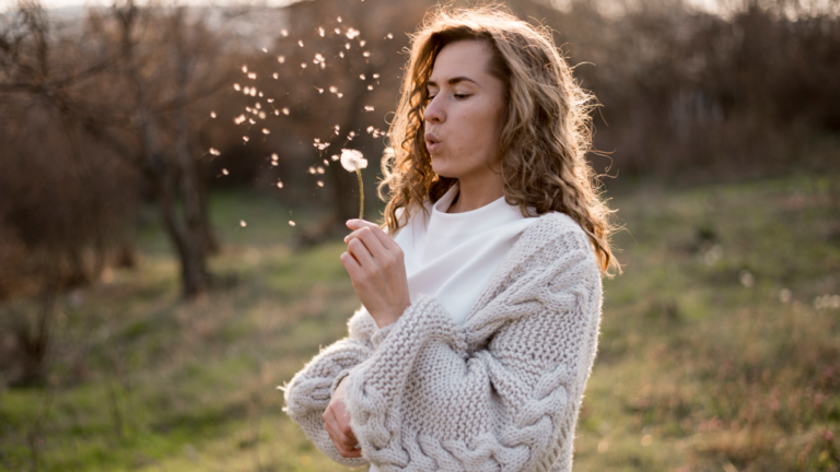 Woman with dandelion